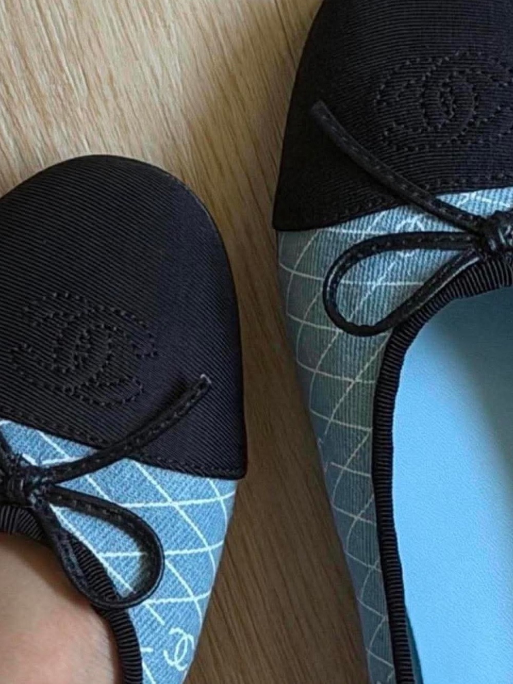 CHANEL Light Blue Quilted Ballet Flats with Black Cap Toe